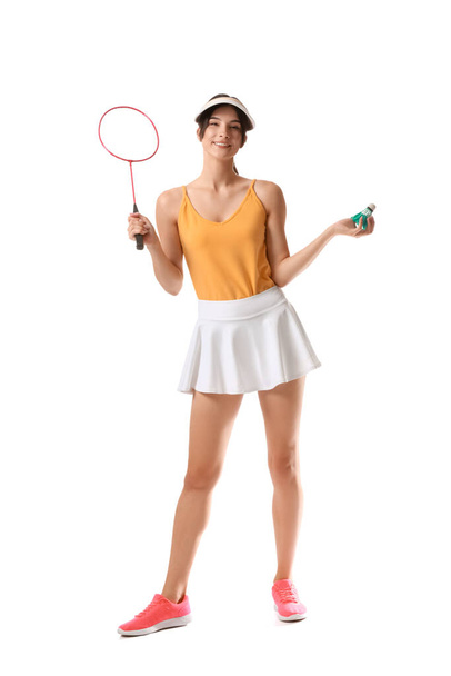 Sporty female badminton player on white background - Foto, Imagen