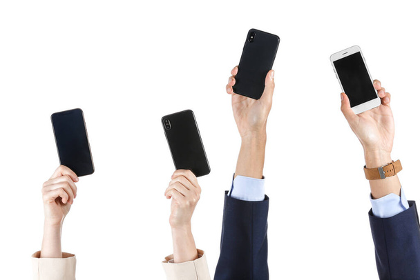 Business workers with mobile phones on white background - Photo, Image