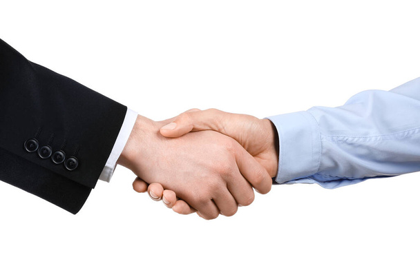 Partenaires commerciaux serrant la main sur fond blanc - Photo, image