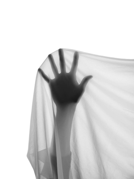 Silhouet van vrouwelijke hand met stof op witte achtergrond - Foto, afbeelding