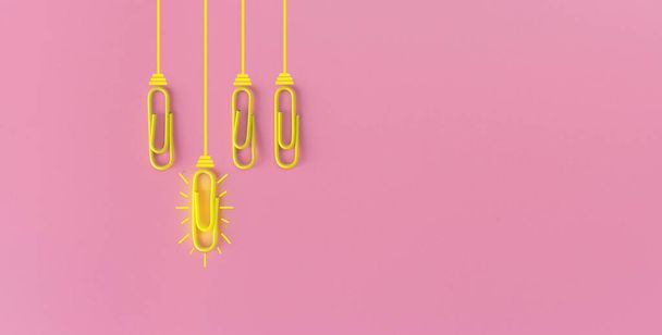 Great ideas concept with paperclip,thinking,creativity,light bulb on blue background,new ideas concept. - 写真・画像