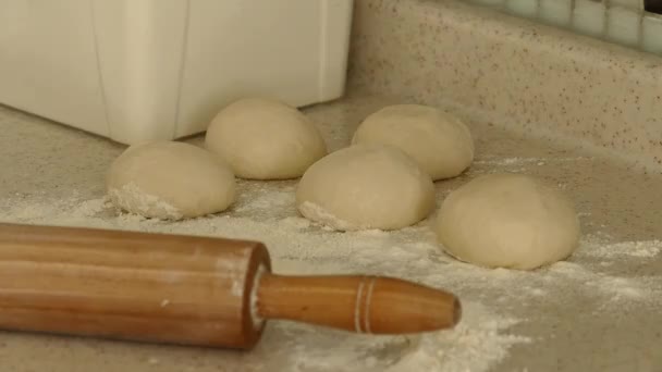dough pieces, a person who rolls dough to make donuts, - Footage, Video