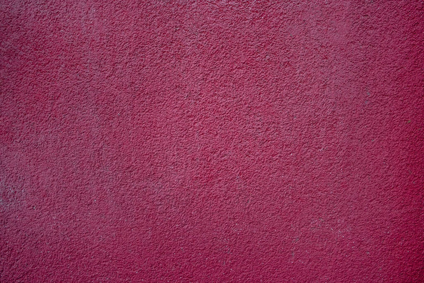 Ciemny różowy lub fioletowy, teksturowana gładka ściana betonowa. tło lub powierzchnia projektu 3D. - Zdjęcie, obraz