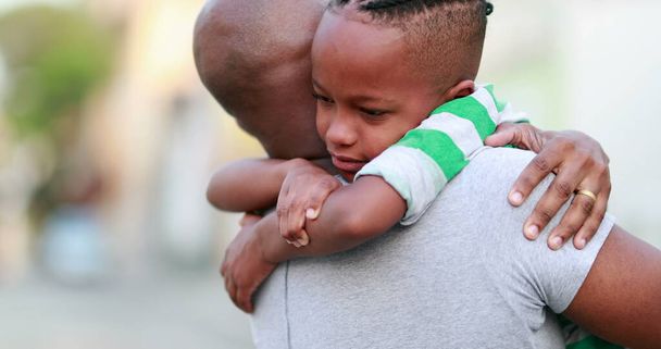 Child hugging father. Back son and dad bonding together. Family love embrace - Fotó, kép