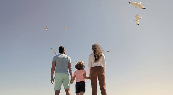 freedom. happy parents with kid boy. mom dad and son love relax together. life insurance - Photo, Image