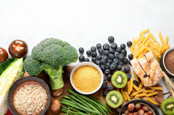 Foods high in fiber on gray background. Healthy food concept. Top view, flat lay, copy space - 写真・画像