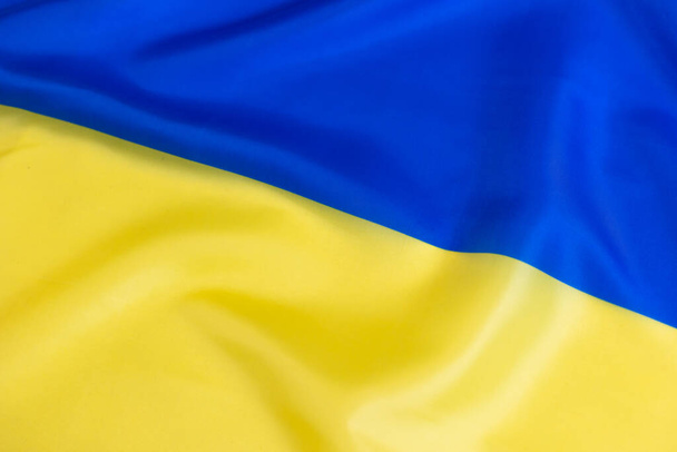 Primer plano de la bandera de Ucrania, la bandera nacional ucraniana - Foto, imagen