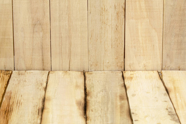 Texture of a wooden wall, background of a wall made of wooden boards. Background with copy space - Photo, Image