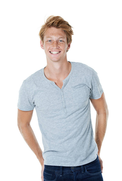 Feeling confident and looking casual. Studio portrait of a handsome young man with ginger hair. - Photo, Image