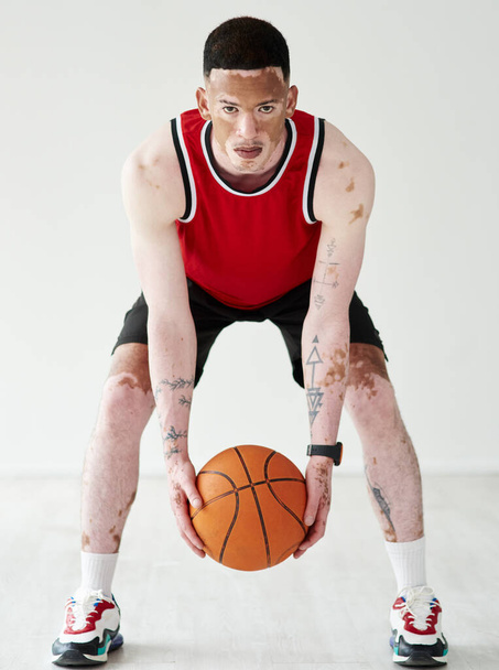 Wanna ball. Full length portrait of a handsome young male basketball player posing in studio. - Φωτογραφία, εικόνα