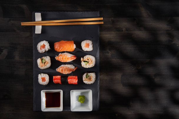 Fresh sushi assortment closeup flat lay - Фото, изображение