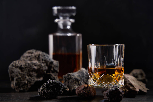 Whiskey on the rocks in a suggestive rustic decor - Photo, image