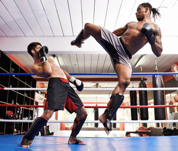 Take this. Two kickboxers in training. - Photo, Image