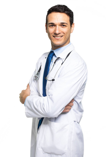 Handsome young doctor portrait isolated on white - Foto, afbeelding