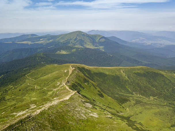 High mountains of the Ukrainian Carpathians in cloudy weather. Aerial drone view. - Photo, Image