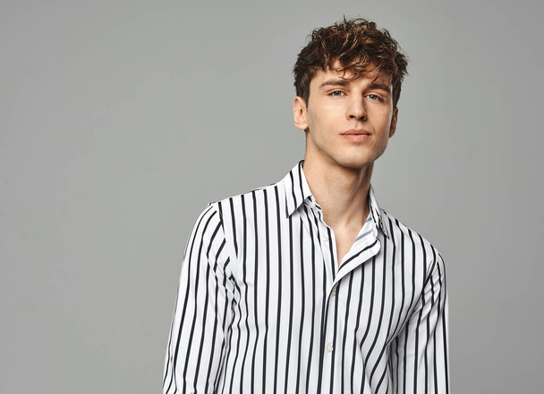 Portrait of hansome man wear striped shirt in black and white  - Foto, Imagem
