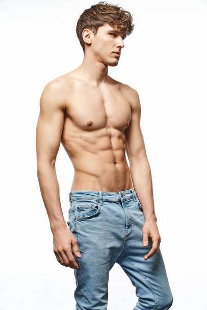 Portrait of sexy man in jeans isolated on white background   - Φωτογραφία, εικόνα