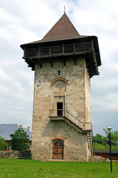 Humor Monastery, Suceava County, Moldavia, Romania: The Tower of Vasile Lupu at the Humor Monastery. A medieval defensive structure at one of the famous painted churches of Moldavia. - Zdjęcie, obraz