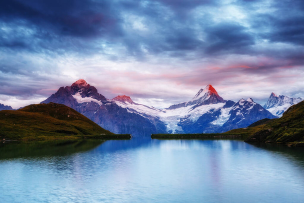 Great view of Mt. Schreckhorn and Wetterhorn above Bachalpsee lake. Dramatic and picturesque scene. Popular tourist attraction. Location place Swiss alps, Grindelwald valley, Europe. Beauty world. - Photo, Image