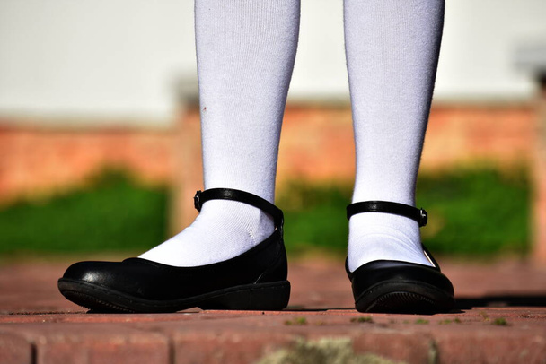 A Girl White Socks And Shoes - Foto, imagen