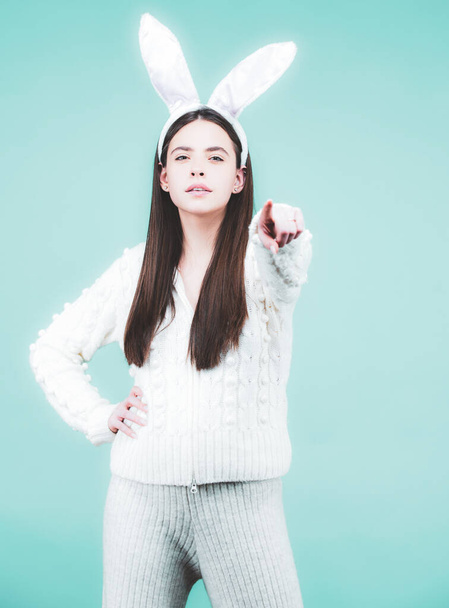 Model dressed in costume Easter bunny. Bunny girl celebrating easter on isolated background. - Zdjęcie, obraz