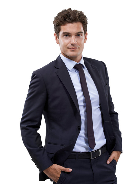 Well suited to his profession. Studio shot of a well dressed businessman against a white background. - Foto, imagen