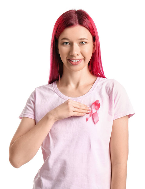 Young woman with pink ribbon isolated on white. Breast cancer awareness concept - Fotoğraf, Görsel