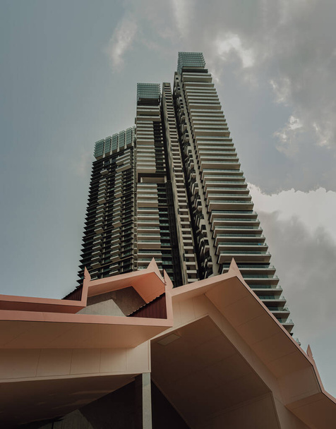 Bangkok, Thailand. Mar - 12, 2022 : Thai contemporary architecture design with Modern tall building in the background can coexist perfectly. Selective Focus. - Foto, imagen
