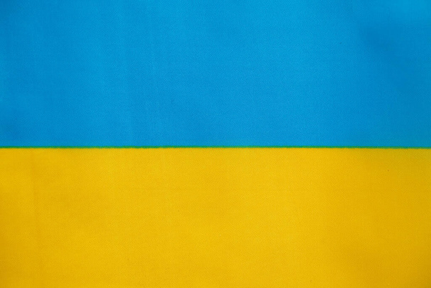 Bandera nacional amarilla y azul de Ucrania como fondo, detener la guerra y la paz en Ucrania, la paz para el pueblo y la libertad - Foto, Imagen