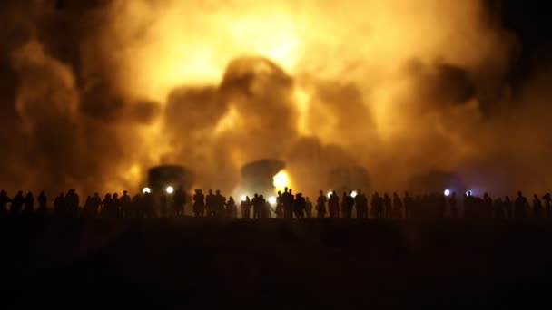 Creative artwork decoration - Russian war in Ukraine concept. Crowd looking on giant explosion and attacking armored vehicles. Selective focus - Footage, Video