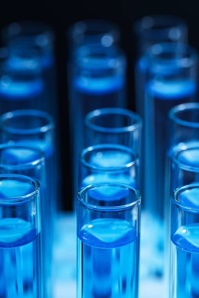 Test tubes with blue reagents, closeup. Laboratory analysis - Zdjęcie, obraz