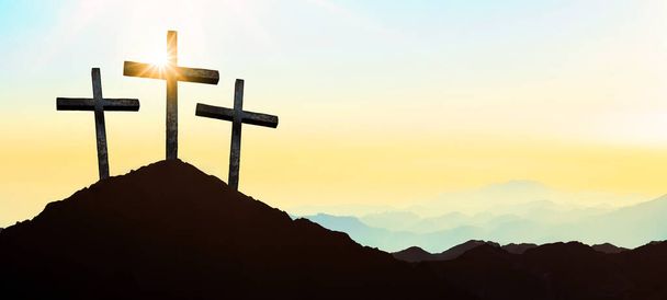 Easter background banner panorama religious greeting card Crucifixion and Resurrection. Three crosses of Golgotha by sunset. - Photo, Image