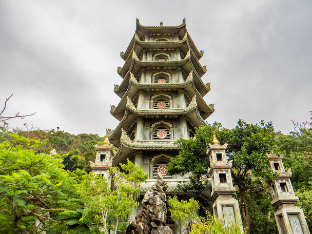 Vietnam. Danang. The Tam Thai Pagoda was originally built in the 17th century CE and was restored during the reign of Emperor Minh Mang (1791 - 1841) The Marble Mountains, about 7km (4 miles) south of Danang, contain a series of caverns that have lon - Photo, Image