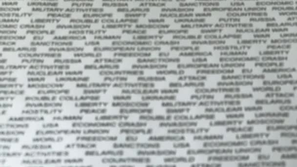 Foto ravvicinata del testo relativo all'Ucraina nera su carta bianca. Invasione russa  - Filmati, video