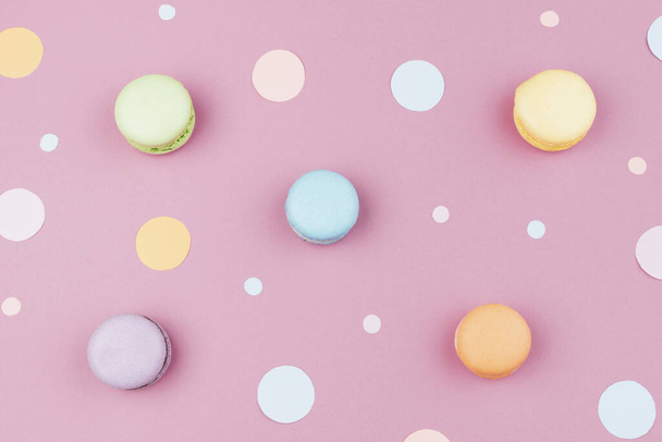 colorful macaroons on a pink background. top view. - Photo, Image