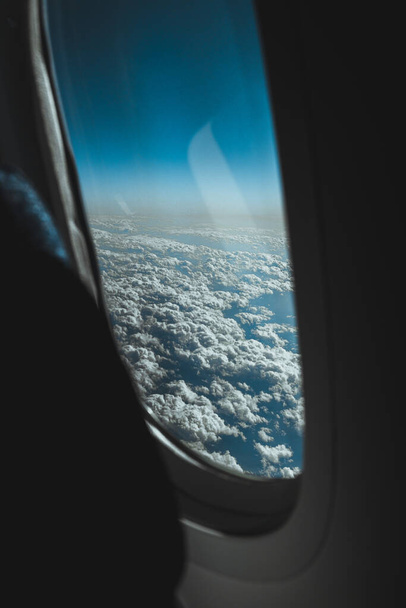airplane flying above clouds - Foto, Imagem