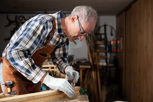 Carpenter Working At Workshop - Photo, Image