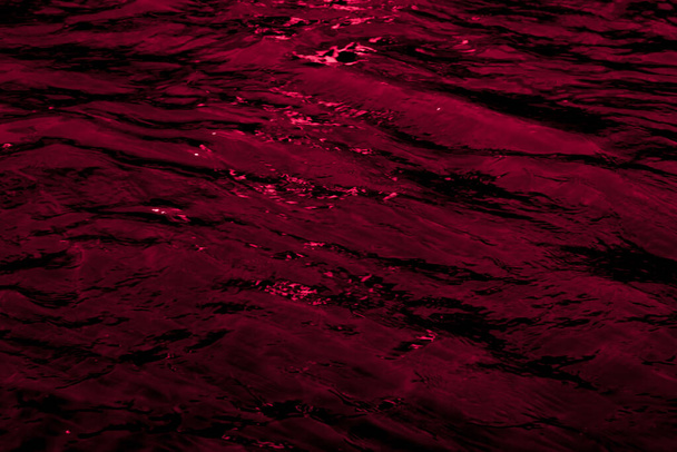 waves on the water surface in dark tones - Fotoğraf, Görsel