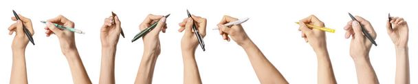 Female hands with different pens on white background - Photo, Image