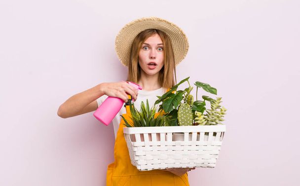 pretty caucasic woman with plants. gardering concept - Photo, image
