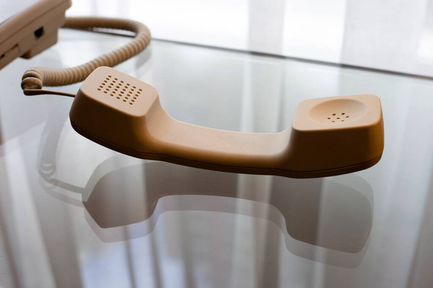 Handset of landline phone on glass table - Photo, Image