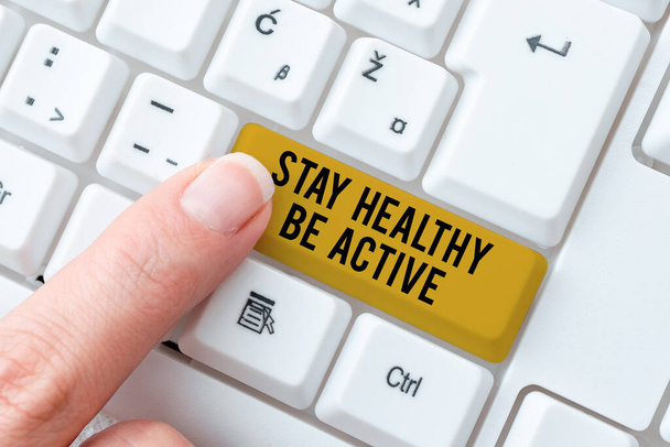 Inspiration showing sign Stay Healthy Be Active. Internet Concept Take care of yourself make exercise workout Abstract Typing License Agreement, Creating Online Reference Book - Photo, Image