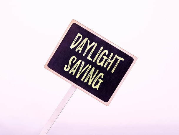 Writing displaying text Daylight Saving. Internet Concept Storage technologies that can be used to protect data Blank Sign Note Holder For New Announcments. Placard For Recent Ideas Plans - Photo, Image