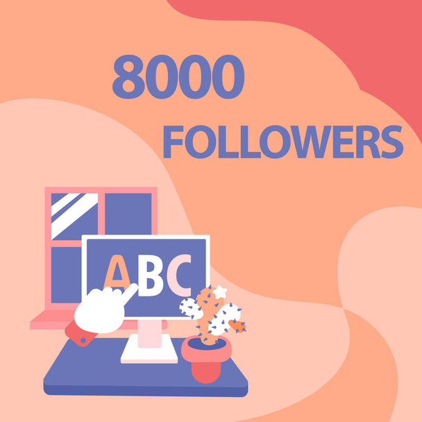 Hand writing sign 8000 Followers. Business idea number of individuals who follows someone in Instagram Hand Showing Letters Pointing Web Browser Screen With Cactus On Side. - Photo, Image