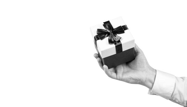 gift box in hand isolated on white background, boxing day - 写真・画像