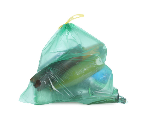 Full green garbage bag isolated on white. Rubbish recycling - Fotoğraf, Görsel