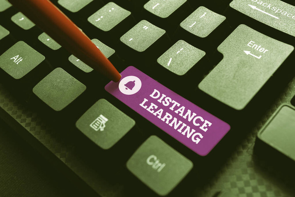 Sign displaying Distance Learning. Internet Concept educational lectures broadcasted over the Internet remotely Typing New Educational Textbook, Abstract Retyping Old Essay Online - Photo, Image