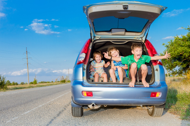 three happy kids in car, family trip, summer vacation travel - Photo, Image