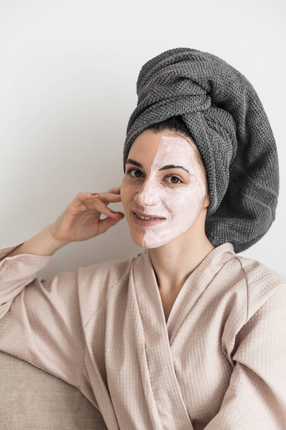 beautiful young woman with facial mask on her face, spa concept - Fotoğraf, Görsel