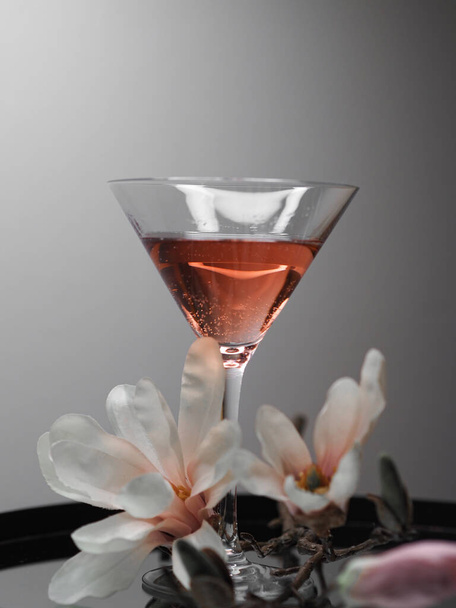 glass of red wine on a grey background - Fotó, kép
